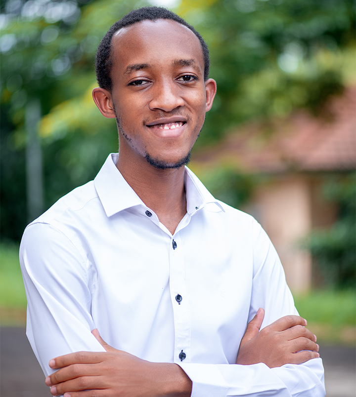 A portrait photograph of Paul O. Mugume.